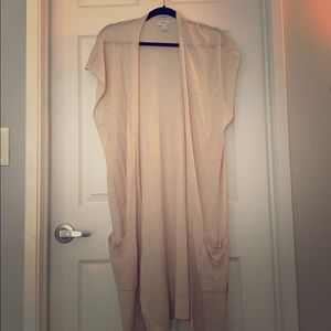 Sleeveless beige duster